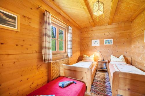 Ferienhaus Rauchegg - Seeblickにあるベッド
