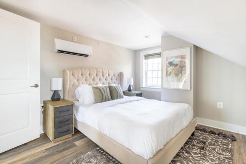 a bedroom with a large bed and a window at Alexandria West 2br w wd nr dining WDC-769 in Alexandria