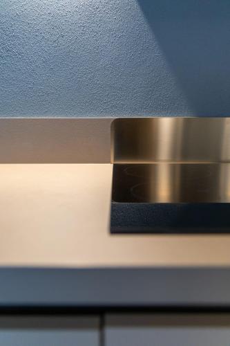 a close up of a metal object on a ceiling at Palais Bernadette in Parma