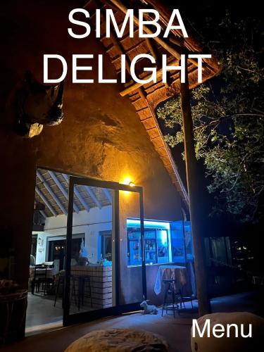 a sign that reads sinaia delphi at night at Simba Safaris African Pride Exotic Lodge in Lephalale