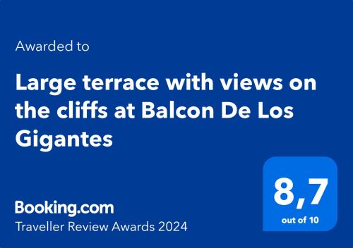 Large terrace with views on the cliffs at Balcon De Los Gigantes في بويرتو دي سانتياغو: شاشة زرقاء مع الكلمات شرفة كبيرة مع مناظر على الهدايا في بال