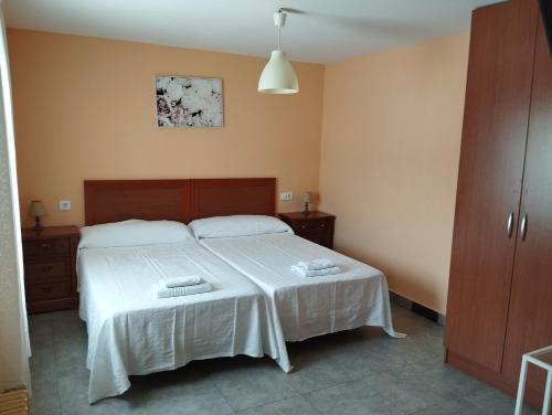 Katil atau katil-katil dalam bilik di Hostal Bordillas