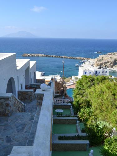 a view of a resort with the ocean in the background at Hotel Finiki View in Foinikion