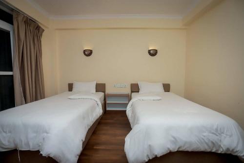 Ένα ή περισσότερα κρεβάτια σε δωμάτιο στο Mountain Vista Retreat