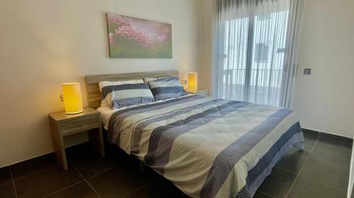 Ένα ή περισσότερα κρεβάτια σε δωμάτιο στο Darsena B 1-2