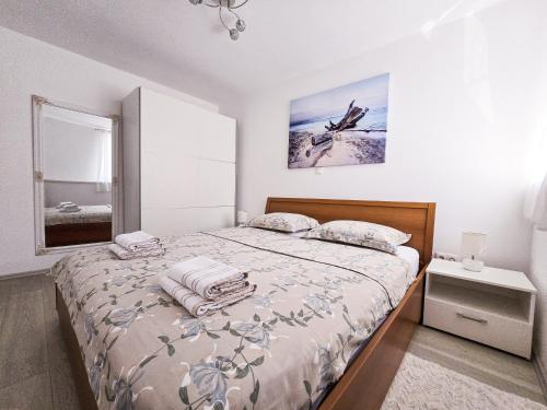 Ліжко або ліжка в номері Stone House Varos Apartments