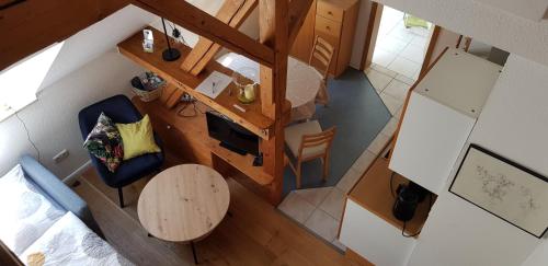an overhead view of a room with a table and a kitchen at Ferienwohnung Helene in Gifhorn