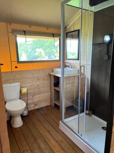 a small bathroom with a toilet and a sink at Seven Hills Hideaway - Blorenge in Llanvetherine