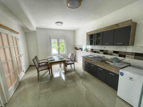 Kuchyň nebo kuchyňský kout v ubytování Apartman Cvetkovic