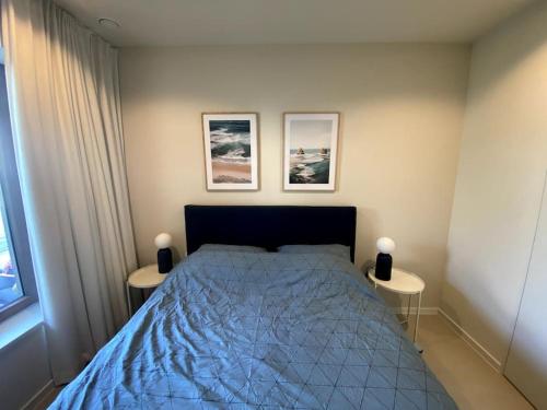 מיטה או מיטות בחדר ב-Westbay 4B - Stijlvol appartement - 2pers