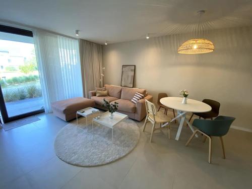 אזור ישיבה ב-Westbay 4B - Stijlvol appartement - 2pers