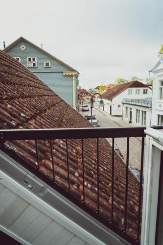 a view of a balcony with a roof at Vanalinna Boutique Hotel in Kuressaare