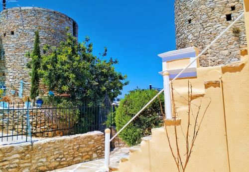 a set of stairs in front of a castle at The Mill House George in Symi