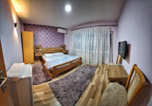 Postel nebo postele na pokoji v ubytování Evropa