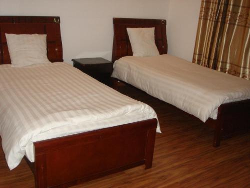 Postel nebo postele na pokoji v ubytování Hotel Restaurant Dao