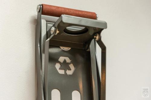 a close up of a suitcase hanging on a wall at Flamingo Centrum in Łódź