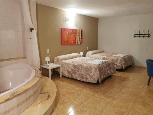 Katil atau katil-katil dalam bilik di Hotel Castellverd