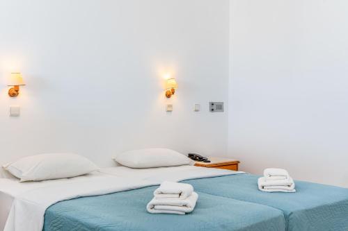 Ένα ή περισσότερα κρεβάτια σε δωμάτιο στο Creta Verano Hotel
