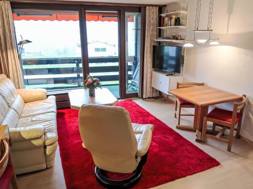 Et sittehjørne på Apartment Utoring Acletta-22 by Interhome