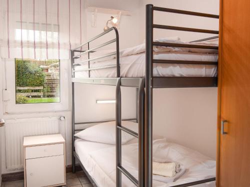 Postel nebo postele na pokoji v ubytování Holiday Home Kajüte by Interhome