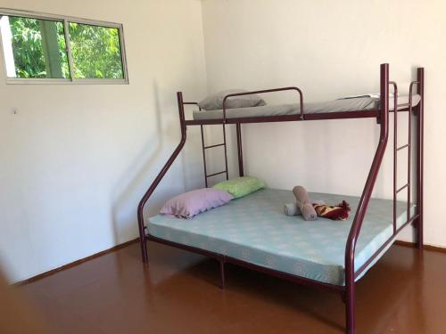Krevet ili kreveti na sprat u jedinici u okviru objekta Rest House Idaman BB Rumah tak kongsi