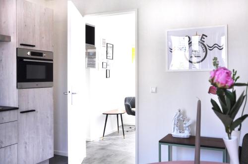 Η κουζίνα ή μικρή κουζίνα στο De Eindhovenaar City Apartments