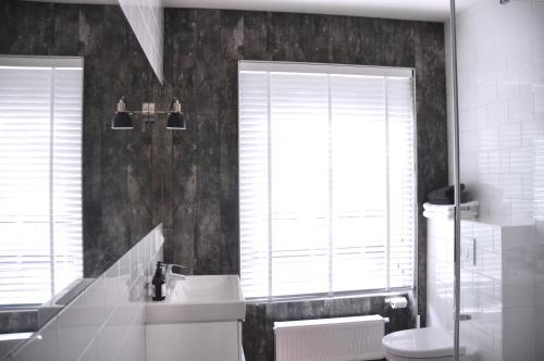 Ένα μπάνιο στο De Eindhovenaar City Apartments
