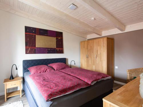 Ένα ή περισσότερα κρεβάτια σε δωμάτιο στο Apartment Ankerplatz by Interhome