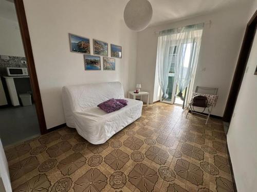 Postel nebo postele na pokoji v ubytování Cà Rosa de Drignana