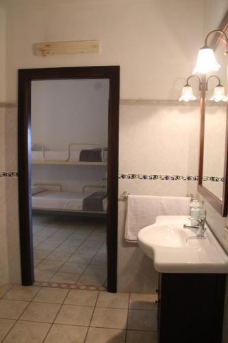 Ένα ή περισσότερα κρεβάτια σε δωμάτιο στο Casa Golloi