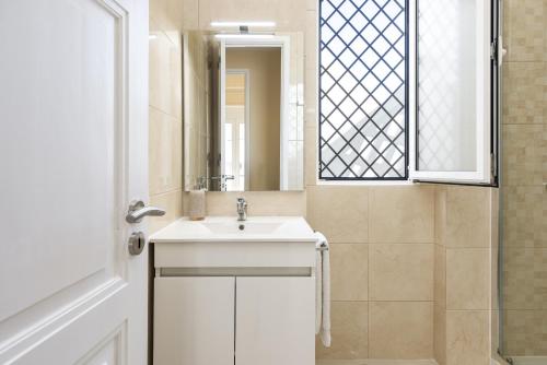 Ένα μπάνιο στο City Rooms Guest House by HD