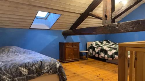 מיטה או מיטות בחדר ב-Maison de 4 chambres avec terrasse amenagee et wifi a Belmont