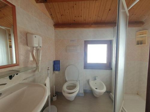 Koupelna v ubytování Il Rifugio di Pan