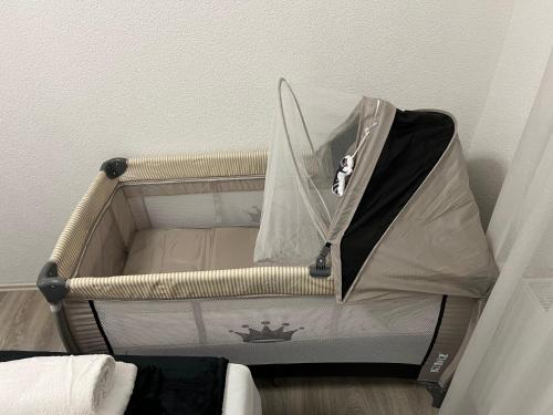 an umbrella sitting on top of a bed at Apartment 1 in Duisburg-Mitte, Altstadt in Duisburg