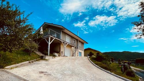 a house on the side of a hill at Sweet home 74 in Frangy