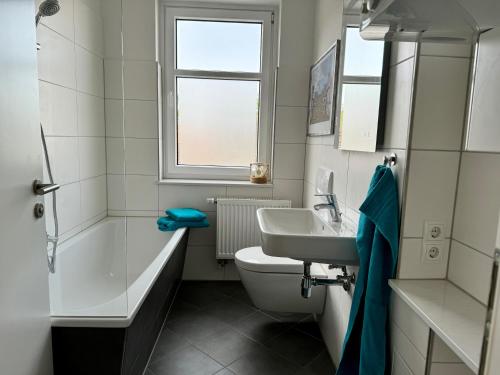 Kylpyhuone majoituspaikassa Apartment im Elbtal