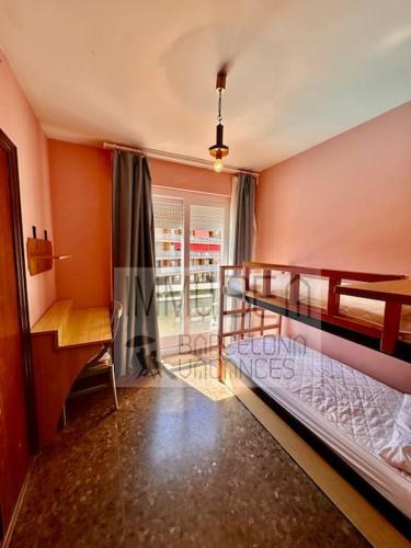 a bedroom with two bunk beds and a window at BV-SV-002-Mediterrani in Sant Andreu de Llavaneres