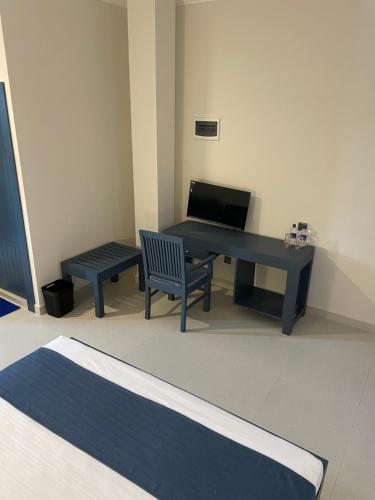 TV a/nebo společenská místnost v ubytování Grand Ben Hotel