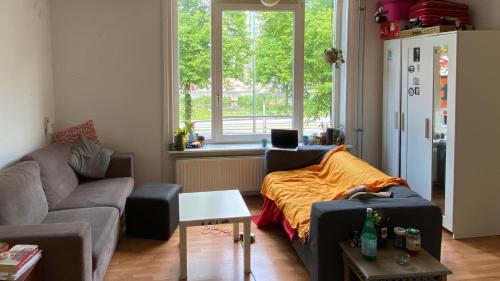 Et sittehjørne på Lovely bedroom in Amsterdam