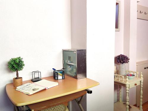 a desk with a fish tank on top of it at Travelers Stasis Nafpaktos in Nafpaktos