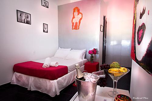 Cama o camas de una habitación en Marilyn Café