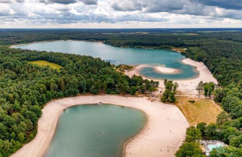 an aerial view of two lakes and a beach at Vakantiepark De Kremmer in Gasselte