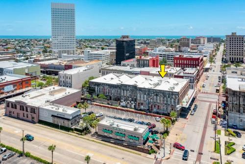 an aerial view of a city with buildings at Historic Strand Lofts by 3rd Coast Getaways in Galveston