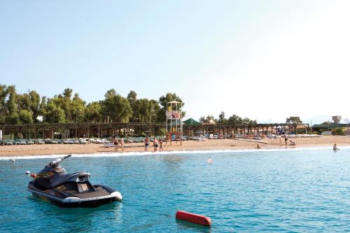 a jet ski in the water at a beach at Marvida Family Eco - Ultra All Inclusive & Kids Concept in Side