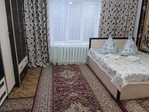 Ένα ή περισσότερα κρεβάτια σε δωμάτιο στο Guest house Lola