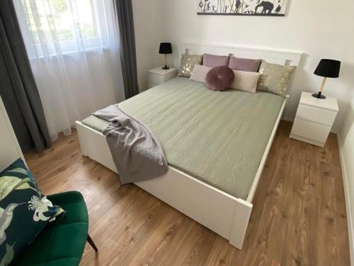 Cama o camas de una habitación en Írisz Apartman