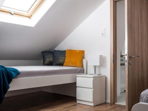 Cama o camas de una habitación en Írisz Apartman