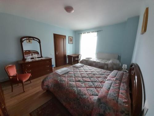 Una cama o camas en una habitación de B&B L'arco Fiorito