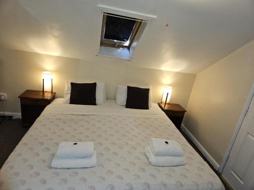 Кровать или кровати в номере Rose Marie Guest House