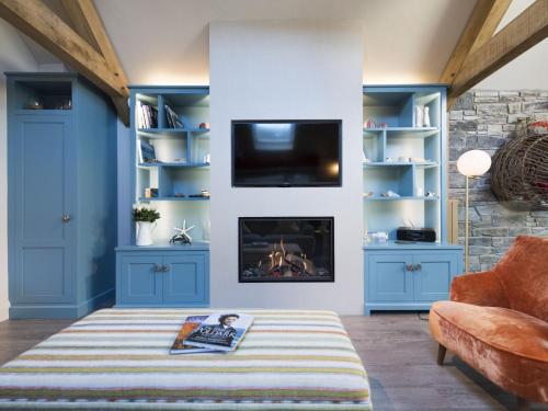 Televisyen dan/atau pusat hiburan di Holiday Home Wella by Interhome
